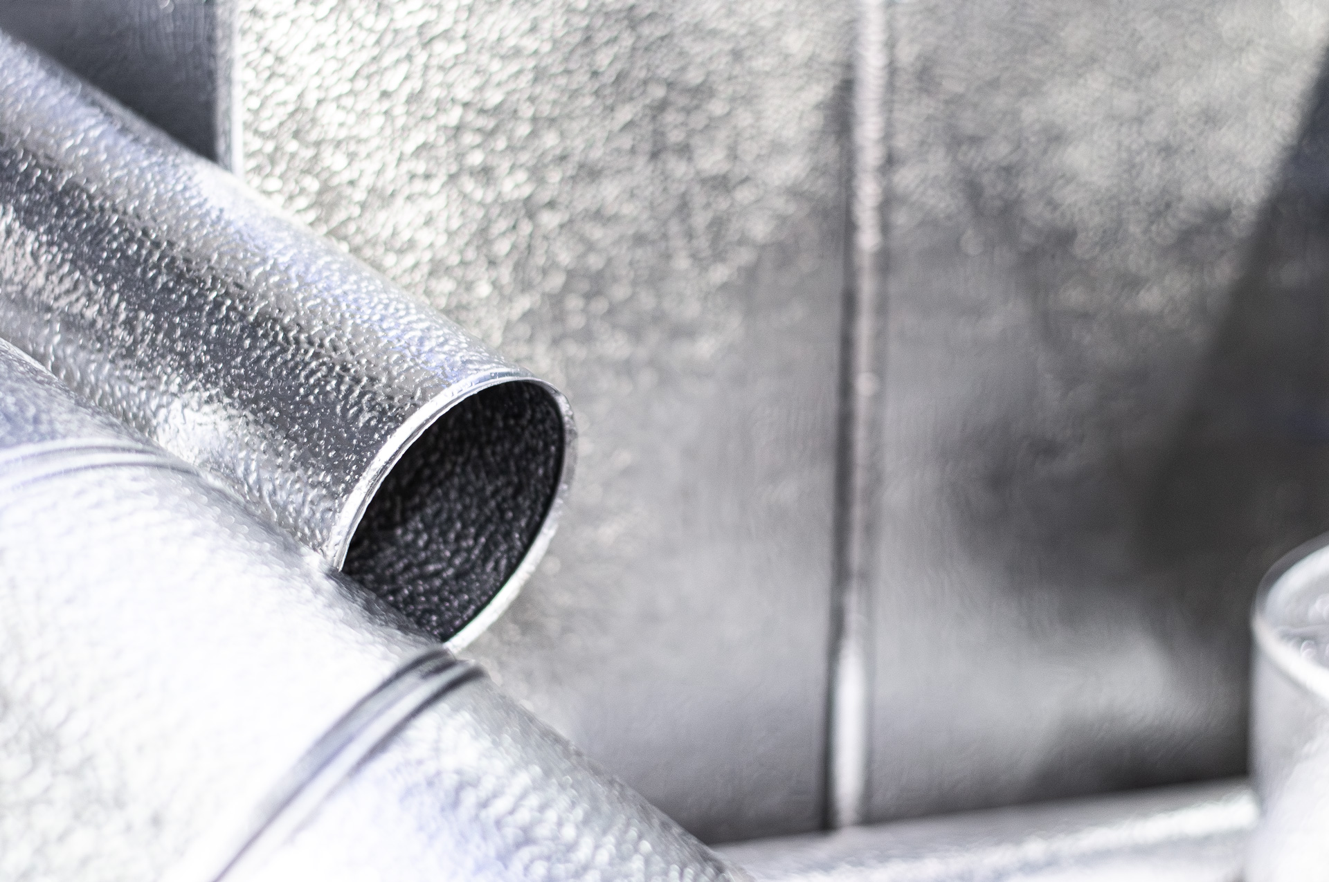 image of tools organized on a workbench (for a plumbing service)